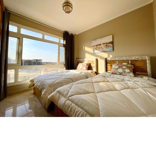 2 BRS Cozy , Warm In Madinaty Free Wifi