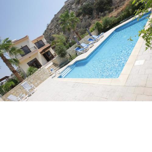 A three-bedroom villa with a private pool and landscaped garden Wi-Fi