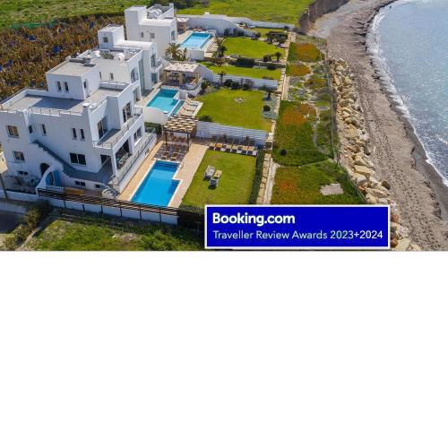 BLUE CORAL BEACH VILLAS three exclusive villas - Poseidon - Nautilus - Oceanos - and - Baby Coral bungalow