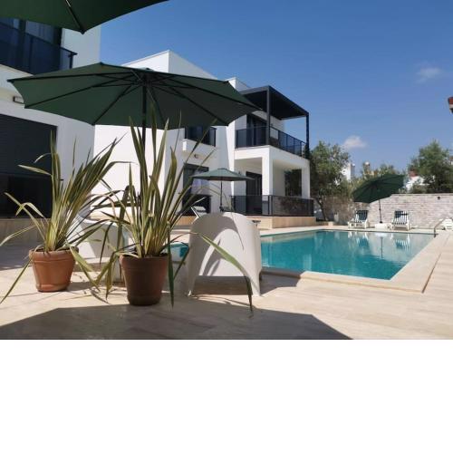 Brand New 2 Bedroom Garden Floor Flat with Pool A1