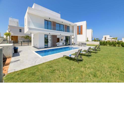 By The Beach - White Coral Villa