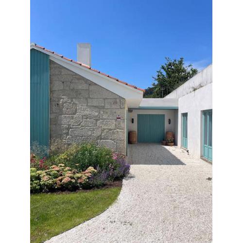Casa soleada con jardin y vistas al mar en Sanxenxo