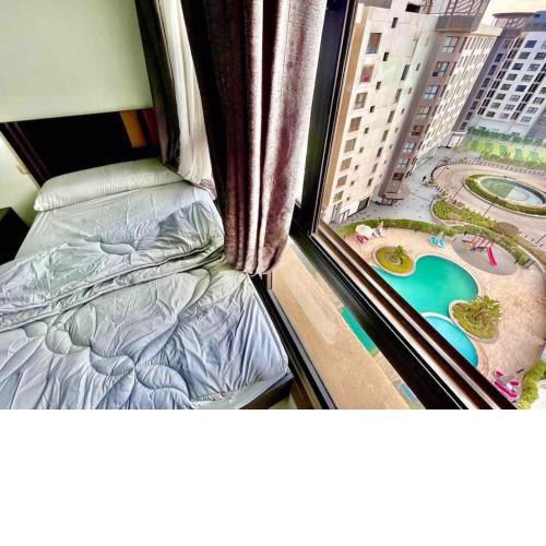 City View 2Brs Direct to the Pool - New Cairo