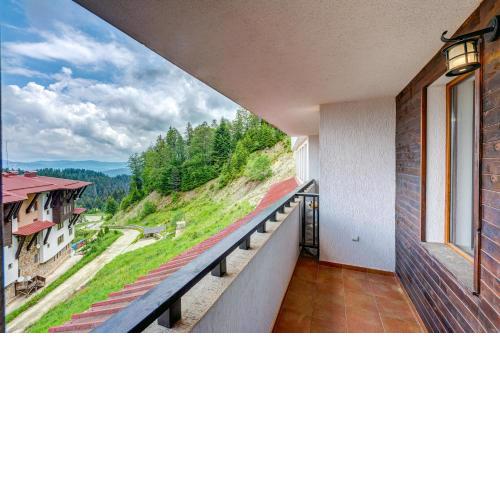 Colorful 2BD Apartment with Indoor Fireplace and Mountain View