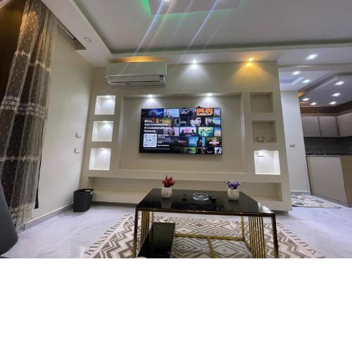 Cozy flat in one kattamya compound