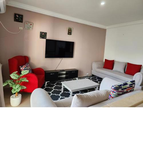 Duplex bien equipe securise avec jardin et veranda