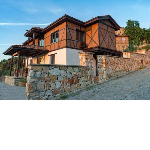 Enjoy the stunning lake view at Korpus Guest House