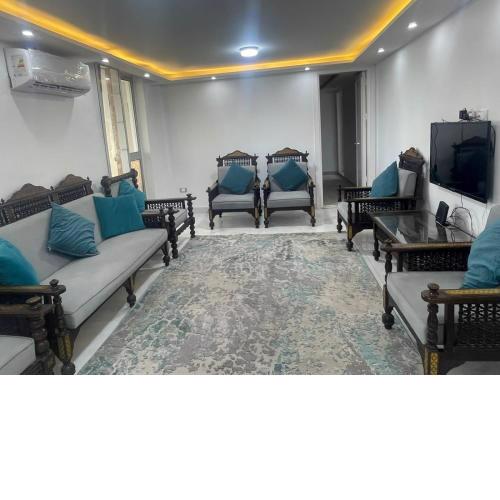 Furnished apartment in Agouza, overlooking the Nile, 3 rooms, two bathrooms, hall, balcony, kitchen and dining room