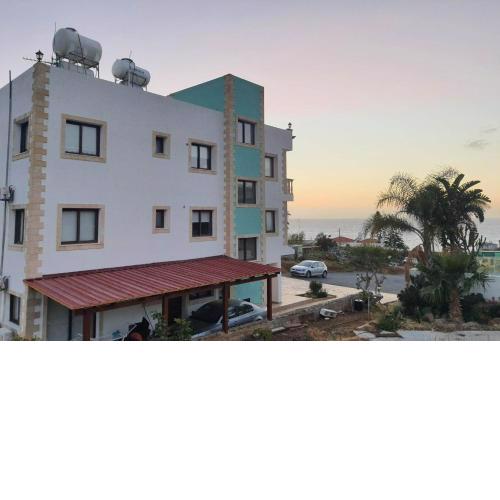 JOANNA SUNSET APTS Pomos