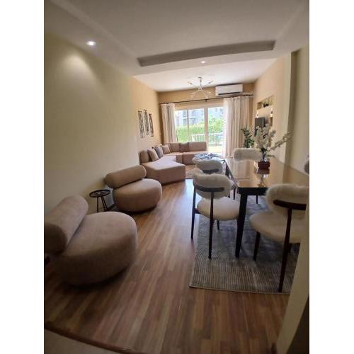 Luxerious apartment with a private garden and pool access