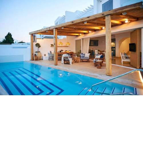 Luxury Protaras Villa | Villa Najenda | 3 Bedrooms | Private Outdoor Pool | Furnished Sun Terrace | Shaded Furnished Terrace | Private Garden | Fig Tree Bay