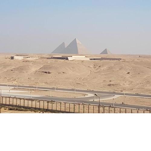 Luxury Pyramids Inn + Tours and Transportations