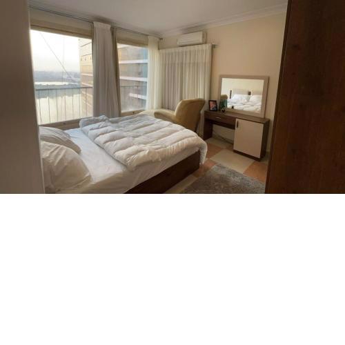 Madi nile and pyramids view 3BR