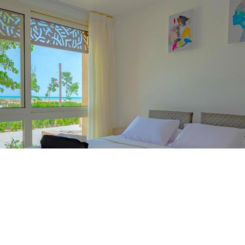 Mangroovy Seaview 3BR Beach and Pool Free access