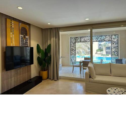 Marvelous 2BR - Free Beach Access and Pool Access In Mangroovy
