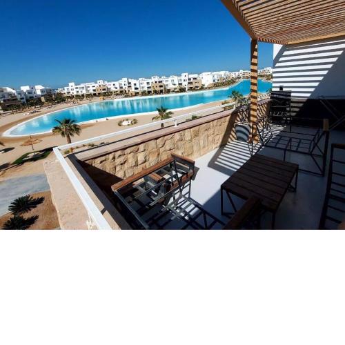 Modern chalet at el gouna Swan Lake compound with Swimable lagoon view