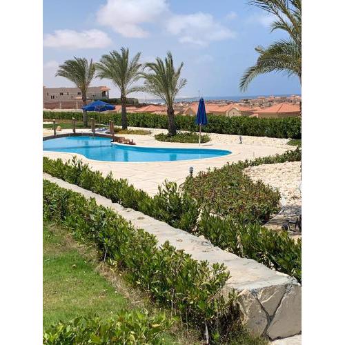 Nice Chalet with garden in Lavisat Bay, north Coast, Egypt
