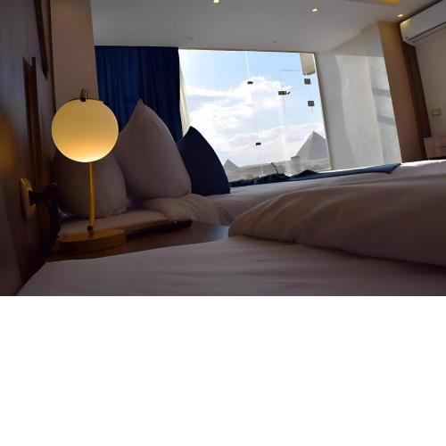 Pharaonic Pyramids Inn