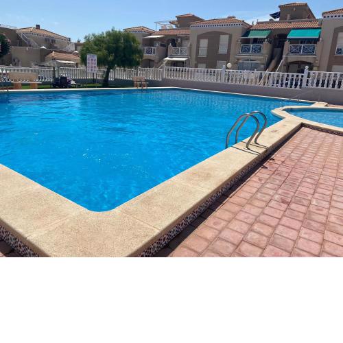 Roof terrace apartment with pool, bikes included