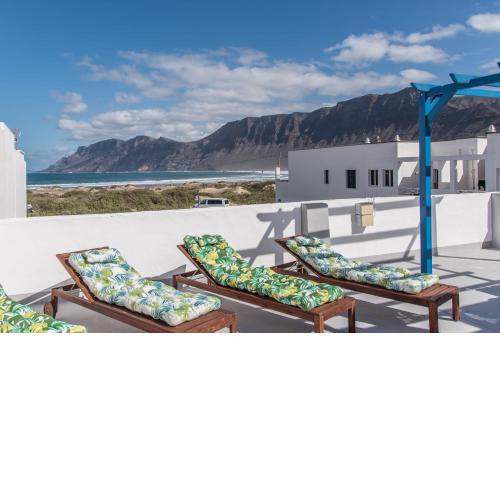 Sandy Bay Home with roof terrace and sea views