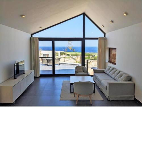 Sea & Golf Views 2BR Villa with Free Beach & Pool Access