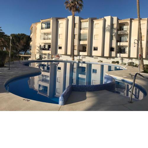 Sea & pool view garden apartment Las Palmeras Nerja