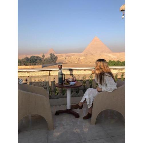 Sphinx palace pyramids view inn