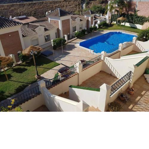 Stunning 2-Bed House in Nerja w. pool, a/c, garage