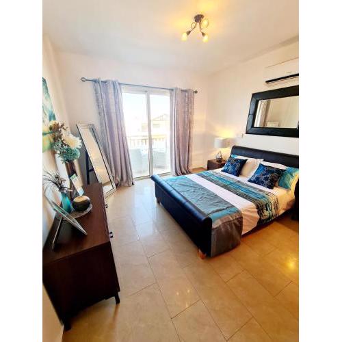 Stunning apartment C106 with balcony looking over pool