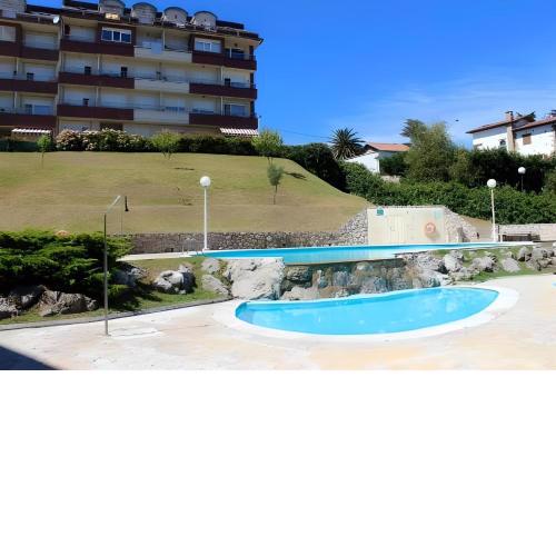 Suances con garaje privado, piscina , pie de playa