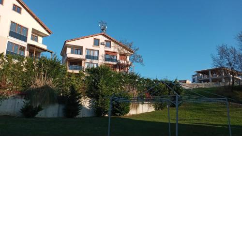 Sultan Villa, Merkez Mahallesi Dogu Sirti Caddesi Sultan Sitesi H-2
