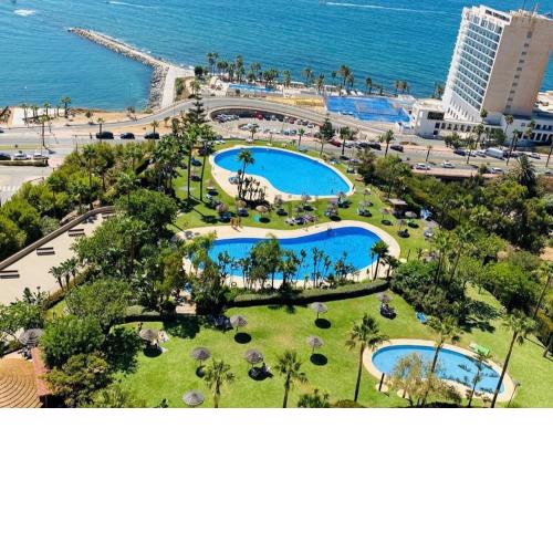 Summer House duplex en la playa con piscina