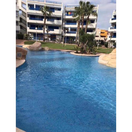 SUN TRAP terrace apartment, 4 pools, ground floor, parking at door