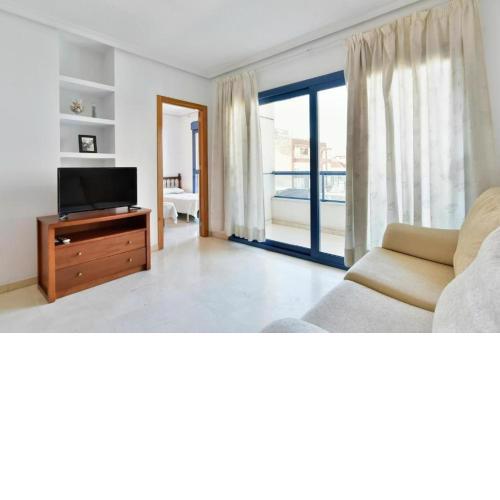 Sunlit 2-Bedroom Oasis at Vicente Blasco Ibáñez 35, Torrevieja
