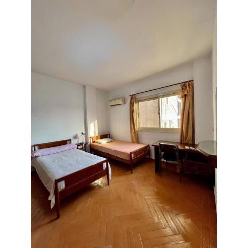 Sunny central room besides AUC downtown