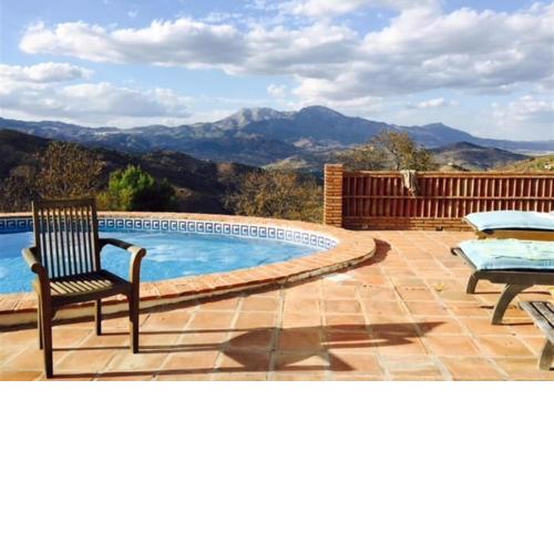 Sunny hillside casita in Guaro