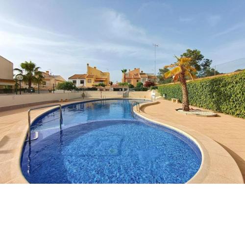 Sunny House Torrevieja with communal pool and garden