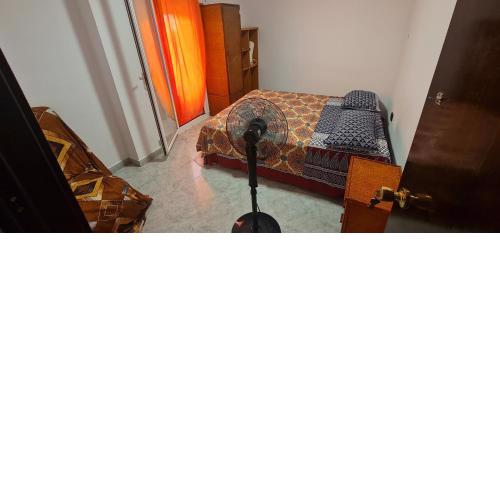 Sunny Room in a Shared apartment in Rubi