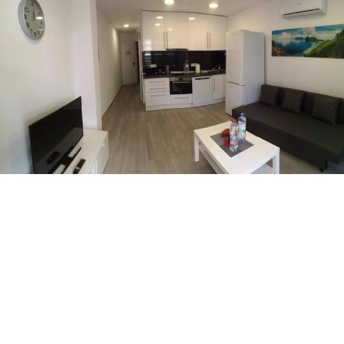 Top-Apartment, 4 OG, seitlicher Meerblick, mit 1 Schlafzimmer im Herzen von Playa del Inglés , Gran Canaria
