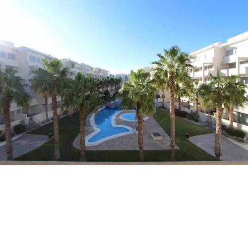 V12 Apartamento cerca de la playa en urbanización con piscina