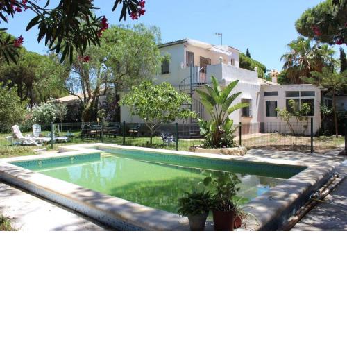 Villa andaluza en zona Playa Barrosa con piscina y barbacoa