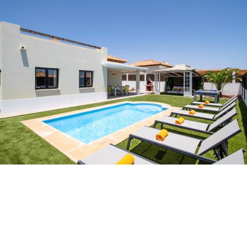 Villa Caleta Heights by Villa Plus