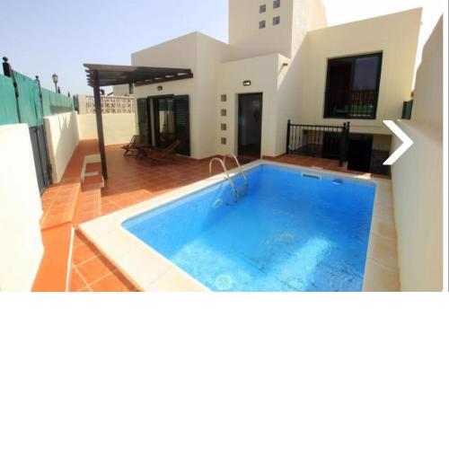Villa con piscina, vistas, dunas, mar, 6 personas