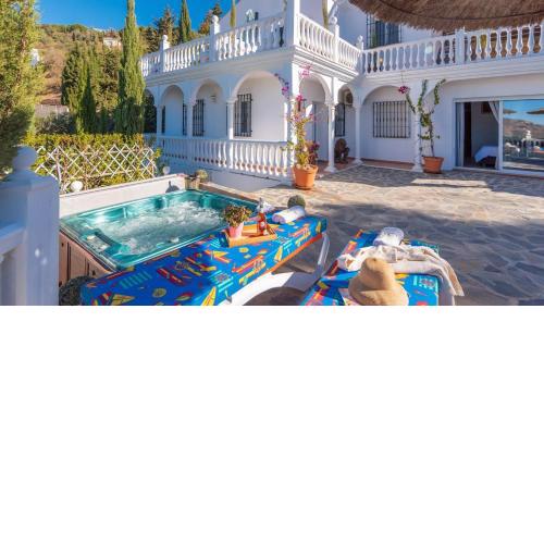 Villa El Arco Iris de la Montana Sayalonga by Ruralidays