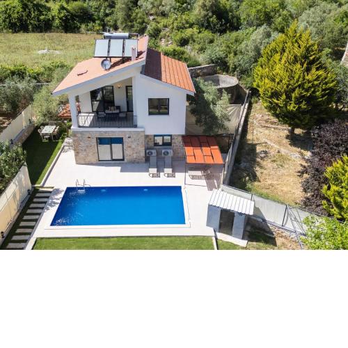 Villa Kızılbella 1, lüks havuzlu korunaklı taş villa