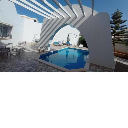 Villa standing avec piscine privée sans vis à vis et WiFi à Djerba