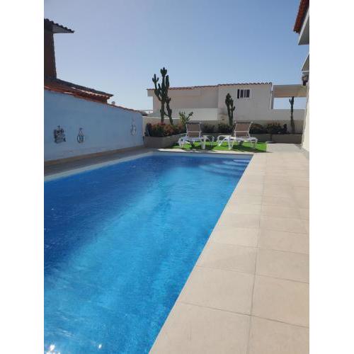 Villa Sunrise with heated pool.