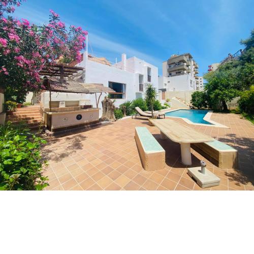 Villa urbana con Piscina en Playa den Bossa