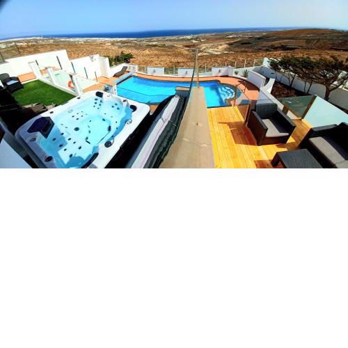 Villa Vista Mar II, 280 qm, heated Pool, HotTube, Gaming Room, fast Internet, Meerblick