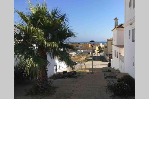 Vivienda adosada a 150m de la playa + patio + wifi